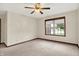 Cozy bedroom featuring neutral carpet, a ceiling fan and window at 177 Jacinta Pl, Bargersville, IN 46106