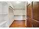 Walk-in closet providing shelving and ample storage for clothing and accessories at 177 Jacinta Pl, Bargersville, IN 46106