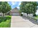 Charming home with a two-car garage, concrete driveway and beautiful trees in the front yard at 177 Jacinta Pl, Bargersville, IN 46106