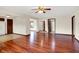 Large living area featuring hardwood floors and an open layout, perfect for modern living and entertaining at 177 Jacinta Pl, Bargersville, IN 46106