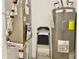 Picture of a utility area featuring a furnace, water heater, and Kobalt brand step ladder at 213 Drewood Dr, Trafalgar, IN 46181