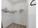 Walk-in closet featuring white wire shelving and a neutral carpet, providing ample storage space at 2169 Aviary Ln, Danville, IN 46122