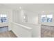 Upstairs landing with large windows and white trim at 2227 Foothill Dr, Greenfield, IN 46140