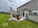Inviting backyard patio with outdoor seating and grill, ideal for entertaining or relaxing at 2231 Abbey St, Brownsburg, IN 46112