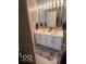 Well-lit bathroom showcasing a double vanity with modern fixtures and ample counter space at 2231 Abbey St, Brownsburg, IN 46112