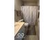 Cozy bathroom features a neutral-toned shower curtain and a well-lit vanity area at 2231 Abbey St, Brownsburg, IN 46112