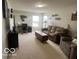 Upstairs bonus room with plenty of space and comfortable furniture at 2231 Abbey St, Brownsburg, IN 46112