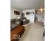 Bonus room featuring comfortable sofa and chair, with baseball decorations at 2231 Abbey St, Brownsburg, IN 46112