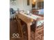 Cozy dining area with a warm wood table, perfect for Gathering dinners and entertaining guests at 2231 Abbey St, Brownsburg, IN 46112