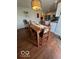 Dining room view features a dining table and chairs next to the kitchen at 2231 Abbey St, Brownsburg, IN 46112