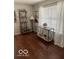 Bright living area featuring a console table, shelving unit and natural light from the window at 2231 Abbey St, Brownsburg, IN 46112