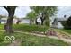 An angle view shows the house exterior and the surrounding neighborhood at 252 Ringwood Way, Anderson, IN 46013