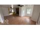 Bright living room features hardwood floors and a stone fireplace at 252 Ringwood Way, Anderson, IN 46013