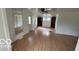 Spacious living room with hardwood floors and large windows at 252 Ringwood Way, Anderson, IN 46013