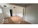 Bright living room with modern lighting fixtures and wood-look laminate flooring at 252 Ringwood Way, Anderson, IN 46013