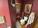 Cozy bathroom with decoratively themed accents, wood floors, and neutral wall coloring at 2937 S Allen Dr, New Palestine, IN 46163