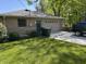 Brick home with a garage and a well-maintained lawn, located in a peaceful residential area at 2937 S Allen Dr, New Palestine, IN 46163