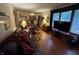 Comfortable living room with hardwood floors and large window for natural light at 2937 S Allen Dr, New Palestine, IN 46163