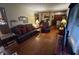 Spacious living room with warm lighting and comfortable seating arrangement at 2937 S Allen Dr, New Palestine, IN 46163
