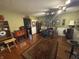 Cozy living room with a fireplace, vintage decor, and ample space for relaxation and entertainment at 2937 S Allen Dr, New Palestine, IN 46163