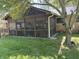 Enclosed screened porch featuring a comfortable outdoor living space with privacy and protection from the elements at 2937 S Allen Dr, New Palestine, IN 46163