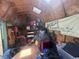 Interior storage shed with open shelving and banner at 2937 S Allen Dr, New Palestine, IN 46163