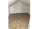 Spacious attic with paneled walls and flooring, offering ample storage and potential living space at 3201 W 22Nd St, Indianapolis, IN 46222