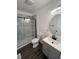 Stylish bathroom featuring a glass-enclosed shower, modern vanity, and sleek fixtures, provides a spa-like experience at 3201 W 22Nd St, Indianapolis, IN 46222