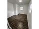 Bright bedroom with wood floors and natural light, creating a welcoming atmosphere for relaxation at 3201 W 22Nd St, Indianapolis, IN 46222