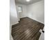 Bright bedroom with wood floors and natural light, creating a welcoming atmosphere for relaxation at 3201 W 22Nd St, Indianapolis, IN 46222