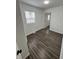 Bright bedroom with wood floors and natural light, creating a welcoming atmosphere for relaxation at 3201 W 22Nd St, Indianapolis, IN 46222