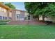 Spacious backyard with a large deck and lush green lawn at 3265 Tulip Dr, Indianapolis, IN 46227