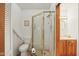 Clean bathroom with tiled shower, white fixtures, and vanity at 3265 Tulip Dr, Indianapolis, IN 46227