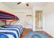 Bedroom featuring a built-in desk and a bunk bed at 3265 Tulip Dr, Indianapolis, IN 46227