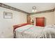 Bedroom featuring neutral walls, floral wallpaper and closet door at 3265 Tulip Dr, Indianapolis, IN 46227