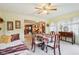 Bright dining area with a view to living room and carpet flooring at 3265 Tulip Dr, Indianapolis, IN 46227