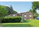 Two-story home with unique architectural features and lush landscaping at 3265 Tulip Dr, Indianapolis, IN 46227
