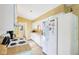 Clean, efficient kitchen with white appliances and wood countertops at 3265 Tulip Dr, Indianapolis, IN 46227