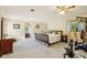 Spacious main bedroom with carpet and a ceiling fan at 3265 Tulip Dr, Indianapolis, IN 46227