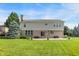 A large yard with a patio is perfect for entertaining friends and Gathering or relaxing outdoors at 3345 Kilkenny Cir, Carmel, IN 46032