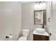 Charming powder room featuring a stylish vessel sink and decorative mirror at 3345 Kilkenny Cir, Carmel, IN 46032