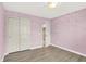 Bedroom with closet and view to hallway at 3345 Kilkenny Cir, Carmel, IN 46032