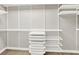Custom closet design with shelves, drawers, and hanging rods at 3345 Kilkenny Cir, Carmel, IN 46032