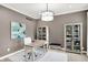 Inviting home office with a modern desk, stylish decor, a cozy rug, and ample natural light at 3345 Kilkenny Cir, Carmel, IN 46032