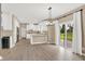 Bright eat-in kitchen features white cabinetry and stainless steel appliances at 3345 Kilkenny Cir, Carmel, IN 46032