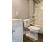 Bathroom features a white vanity, toilet, and shower-tub combo at 3464 N Bancroft St, Indianapolis, IN 46218