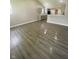 Bright, open-concept living area boasts sleek floors and seamless flow to the kitchen space at 3464 N Bancroft St, Indianapolis, IN 46218
