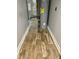 The utility room features wood-look flooring, a water heater, and a furnace at 3464 N Bancroft St, Indianapolis, IN 46218