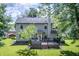 Enjoy a deck in this backyard with lush green lawn and mature trees at 3474 Glen Abbe Ct, Carmel, IN 46032