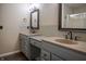 Bathroom featuring double sinks, a granite countertop, a glass shower door, and wood look tile flooring at 3474 Glen Abbe Ct, Carmel, IN 46032